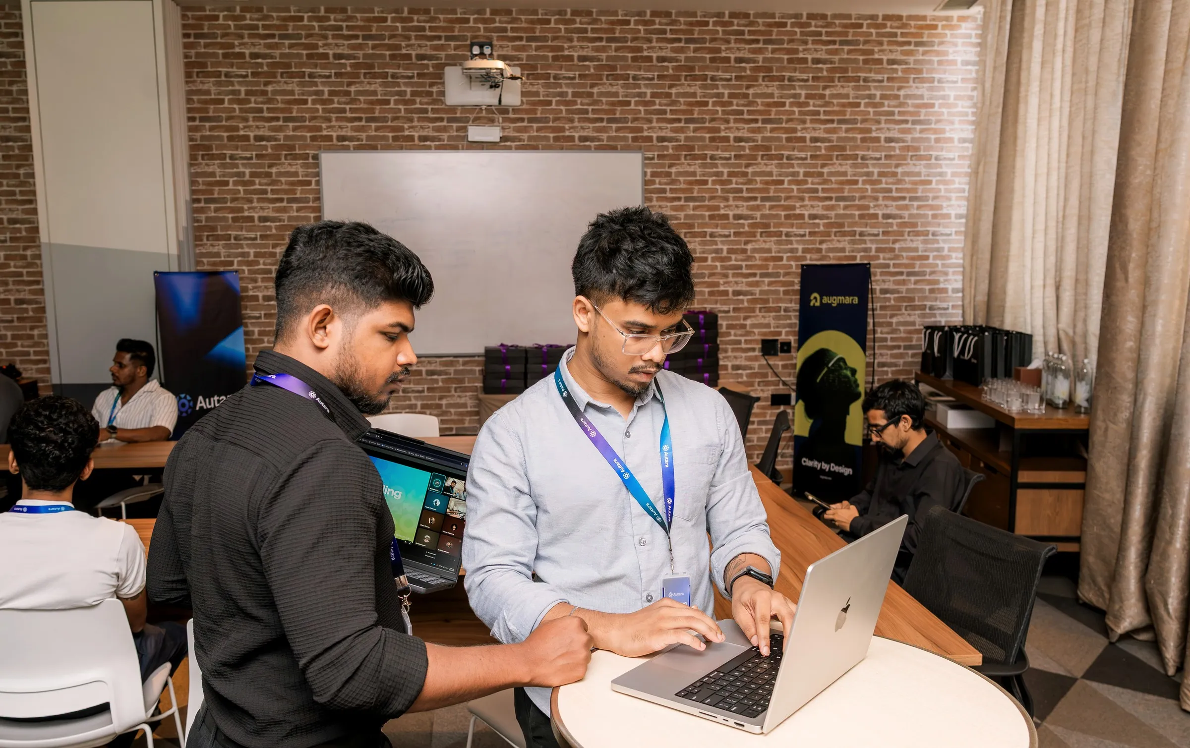 Ravindu Fernando working on a laptop